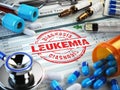 Leukemia diagnosis. Stamp, stethoscope, syringe, blood test and Royalty Free Stock Photo