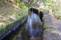 Levada das 25 fontes, irrigation canal detail view, touristic hiking trail, Rabacal, Madeira island