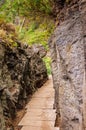 Levada path through great rocks, Madeira Royalty Free Stock Photo
