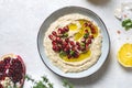 Levantine appetizer Baba ghanoush baked eggplant appetizer served with pomegranate seeds Royalty Free Stock Photo