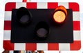 Level crossing lights signalling to stop