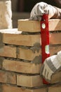 Leveling the masonry bricks Royalty Free Stock Photo