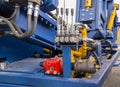 Levers and pressure control unit of the hydraulic machine closeup