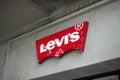 Levi Strauss shop sign on a wall