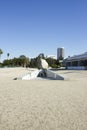 Levitated Mass Over Walkway While Visitors Engage by Walking Under Royalty Free Stock Photo