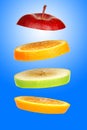 Levitating fresh sliced fruit