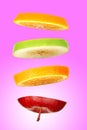 Levitating fresh sliced fruit