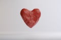 Levitating red ballRed heart for Valentine`s day