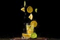 Levitating slices of lemon and lime, a splash of water. Royalty Free Stock Photo