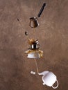 Levitation coffee and tea splashes on brown background Royalty Free Stock Photo