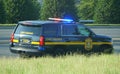 Lewes, Delaware, U.S - July 11, 2021 - The blue police car on the street