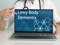 Lewy Body Dementia phrase on the screen. Hematologist use cell technologies at office