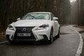 Lexus IS 250 hybrid car is parked in the wood