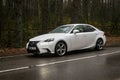 Lexus IS 250 hybrid car is parked in the wood