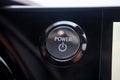 Lexus RX 450h plus dashboard POWER start stop button close view Royalty Free Stock Photo