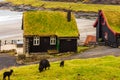 Small village Leynar situated on the slope of the mountain, Faroe Islands