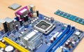 LGA socket on motherboard close-up. Blue motherboard Royalty Free Stock Photo