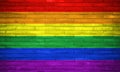 LGBT civil rights rainbow flag painted on bricks wall. Copy space for text or graphic. Royalty Free Stock Photo