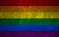 LGBT civil rights rainbow flag painted on grunge wall. Copy space for text or graphic.