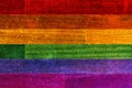 LGBT civil rights rainbow flag painted on wood planks. Copy space for text or graphic. Royalty Free Stock Photo