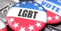 Lgbt and elections in the USA, pictured as pin-back buttons with American flag colors, words Lgbt and vote, to symbolize that t