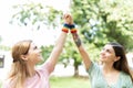 LGBT friends supporting gay rights with rainbow bracelets Royalty Free Stock Photo