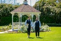 Lgbt gay marriage couple having romantic moment together after wedding ceremony. Concept of LGBTQ. Gay couple wedding Royalty Free Stock Photo