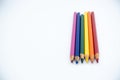 LGBT and Gay Pride rainbow colored pencils against a white background. Equality and Diversity concept - image