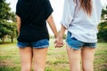 LGBT lesbian women couple moments happiness. Lesbian women couple together outdoors concept.