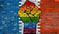 LGBT Protest Fist on a France brick Wall Flag