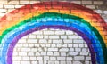 LGBT rainbow on a brick wall. Red, orange, yellow, green, blue, indigo, purple. Royalty Free Stock Photo