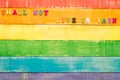 Lgbt rainbow colors wooden background with inscription shall not live in vain