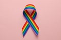 LGBT rainbow ribbon pride symbol. Stop homophobia. Pink background Royalty Free Stock Photo