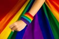 LGBTQ flag and hand. Pride flag symbol of Lesbian Gay Bisexsual Transgender Queer or homosexsual