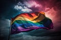 LGBTQ flag waving in the wind at cloudy sky