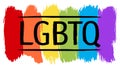 LGBTQ sign with rainbow flag