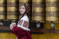 Lhasa, Tibet, China, Chengguan District, June 27 2019: closeup of beautiful young make up girl wearing traditional Tibetan clothes