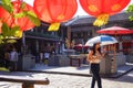 Lhong 1919, a girl with umbrella walk around place Royalty Free Stock Photo