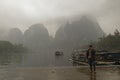 Li River,Guilin,China, 22th, March, 2014, boatman stands on the