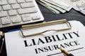Liability insurance agreement on the desk. Royalty Free Stock Photo