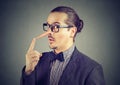 Liar business man with long nose Royalty Free Stock Photo