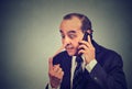 Liar customer service representative. Man with long nose talking on mobile phone lying Royalty Free Stock Photo