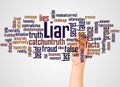 Liar word cloud and hand with marker concept Royalty Free Stock Photo