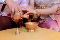 libation, Thai engagement, pour water in Thai wedding, pouring water in Thai wedding.
