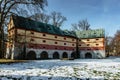 Libechov, old abandoned baroque building in central Bohemia,Czech republic.Romantic large house with red facade and park.Rebuilt