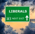 LIBERALS road sign against clear blue sky Royalty Free Stock Photo