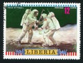 Astronauts placing scientific equipment on Moon