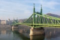 The Liberty Bridge in Budapest in Hungary, it connects Buda and Pest cities across the Danube river Royalty Free Stock Photo