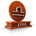 Libra zodiac sign. 3D illustration of the zodiac sign Libra made of stone on a wooden stand with the name of the sign at the base. Royalty Free Stock Photo