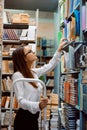 Librarian worker standing on the ladder